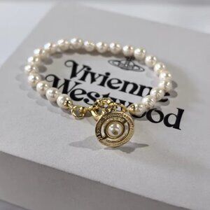 Vivienne Westwood Pearl Bracelet – Gold Orb Charm, Classic Elegant Style